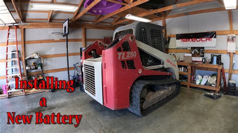 takeuchi skid steer battery replacement|takeuchi tl250 battery installation.